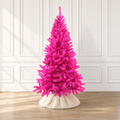 Pink artificial Christmas tree with dense flocked needles on a white fabric base