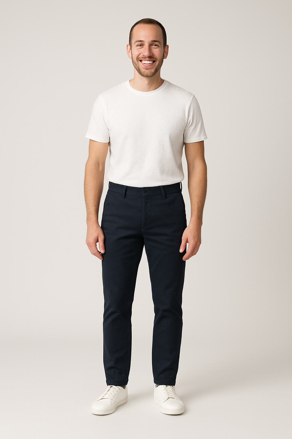 Men's slim chino pant in dark navy, flat front with belt loops and button closure.