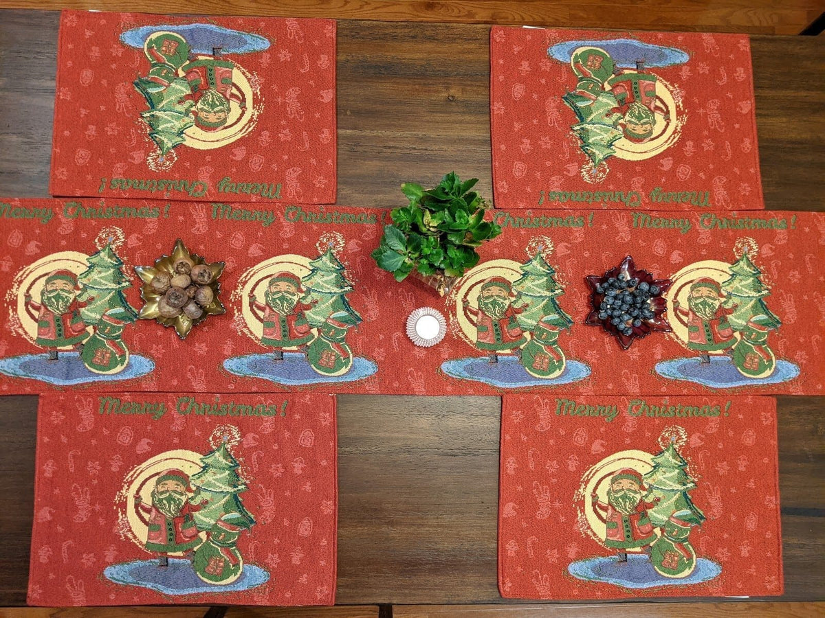 Red Christmas tapestry placemats arranged in a grid with Santa artwork