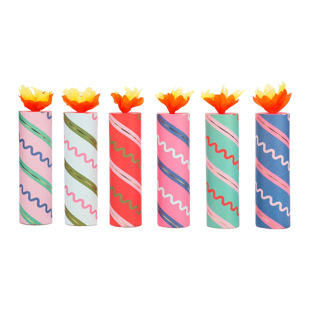 Set of 6 birthday crackers, striped pink blue green with orange paper flame tips
