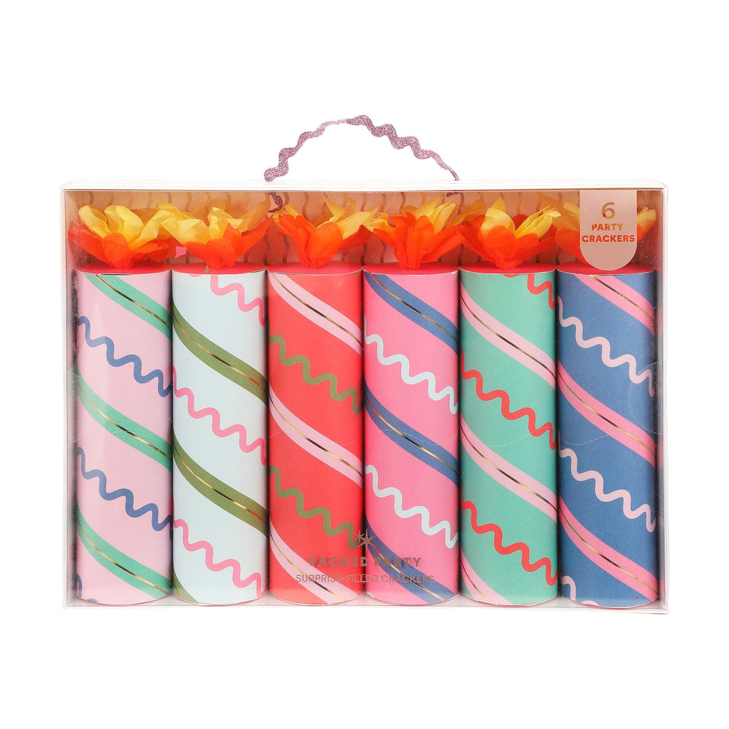 Box of 6 birthday party crackers, striped pink blue green with orange tassels