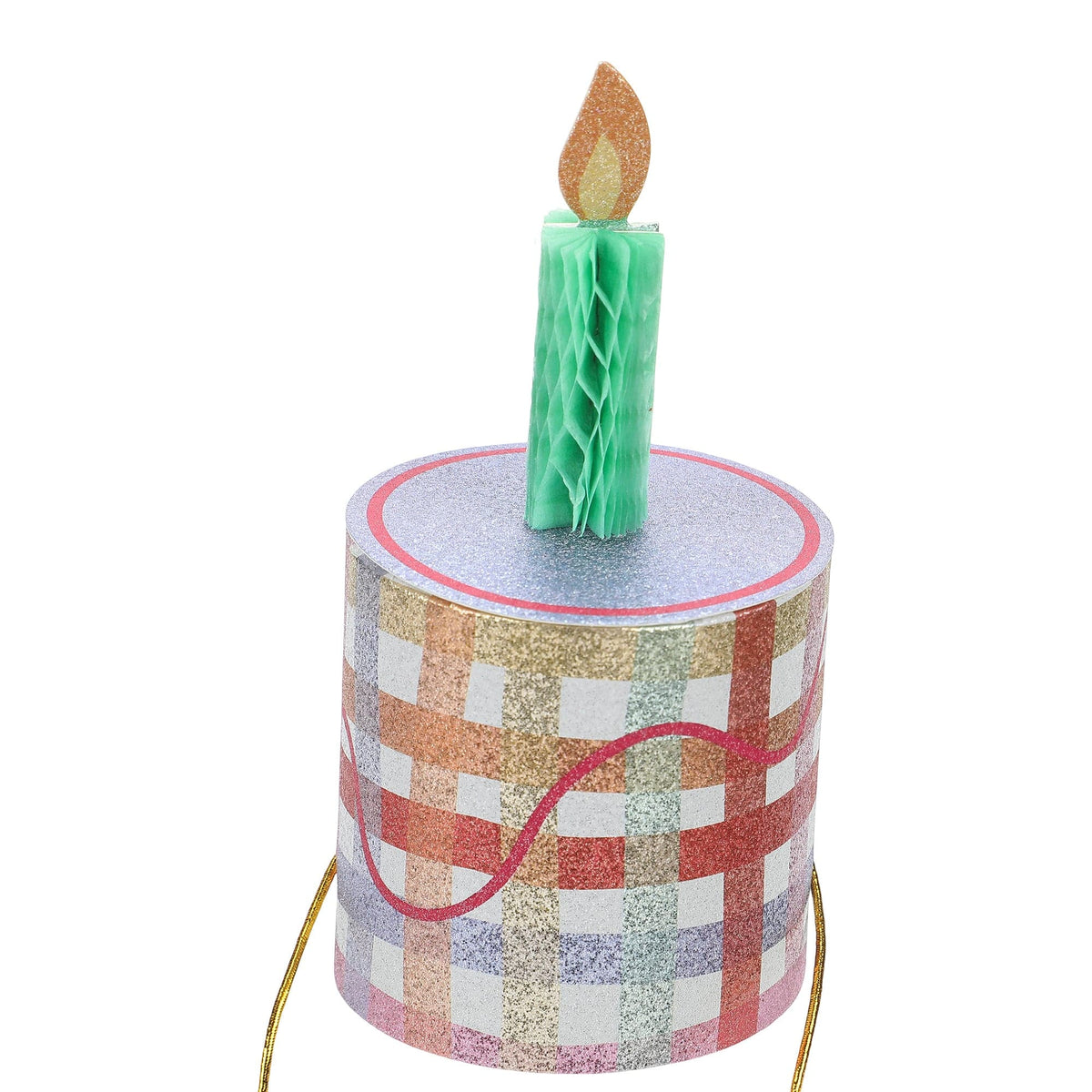 Mini birthday cake party hat with tall green candle topper on a checkered mini cylinder