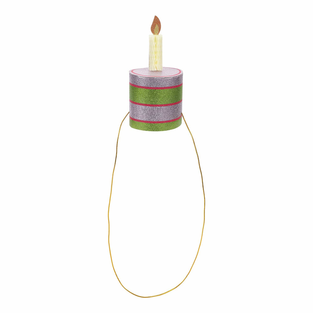 Green and purple striped cake party hat with pale yellow candle and gold ties