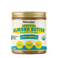 Sprouted almond butter jar with coconut oil and vanilla, gold lid, front label by Philosopher