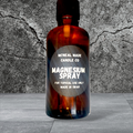 Magnesium spray bottle with amber glass and front label reading Magnesium Spray