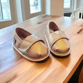 Gold metallic slip-on barefoot shoe topper with two adjustable hook-and-loop straps