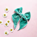Sea-glass velvet bow with long ribbon tails and center knot