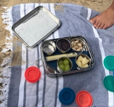 Stainless steel bento snack box with divided compartments and latch, open