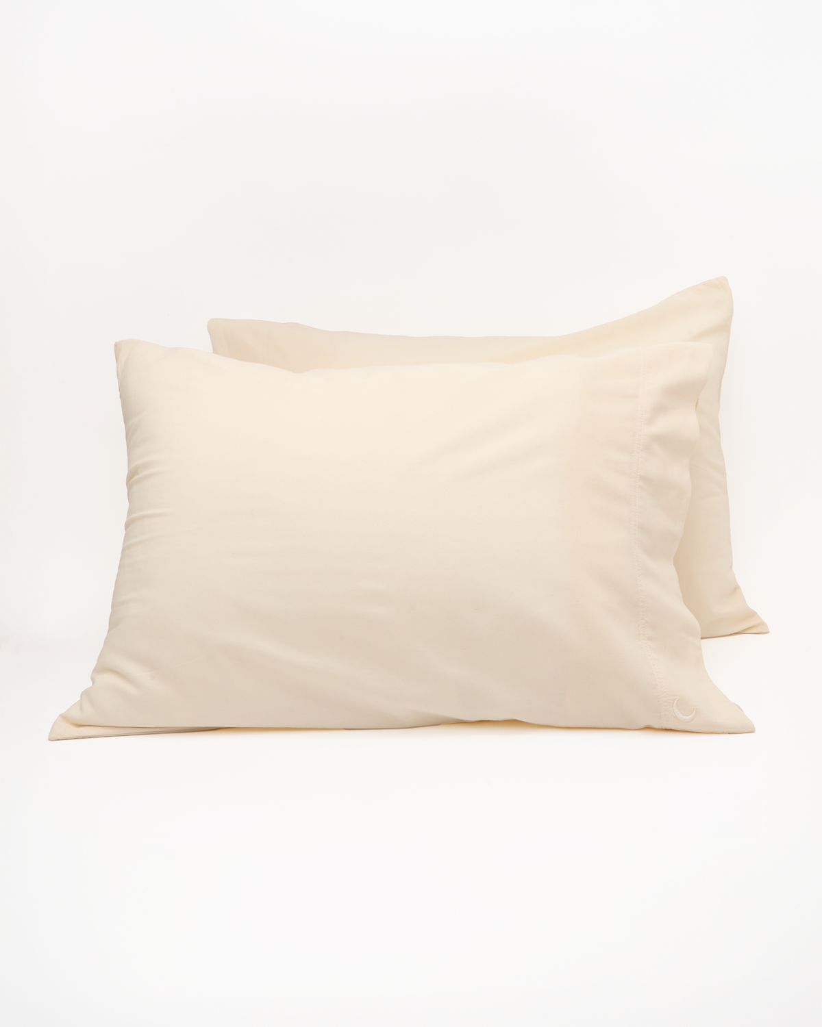 Cream milk-fibre pillowcase set, single pillowcase front view with stitched edge