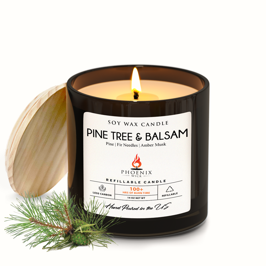 Black soy wax candle with lit wick; Pine Tree & Balsam scent label.