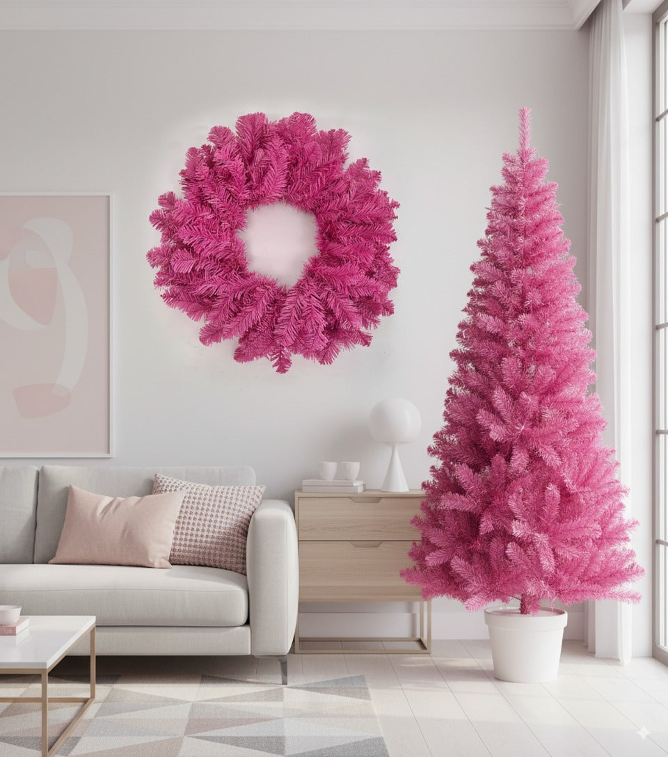 Pink artificial Christmas tree with dense branches and a white pot-style base