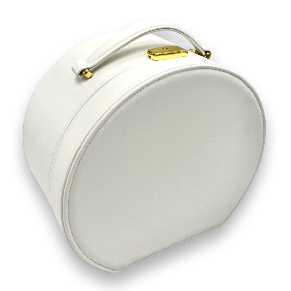 Cream round keepsake box with top handle and gold-tone latch