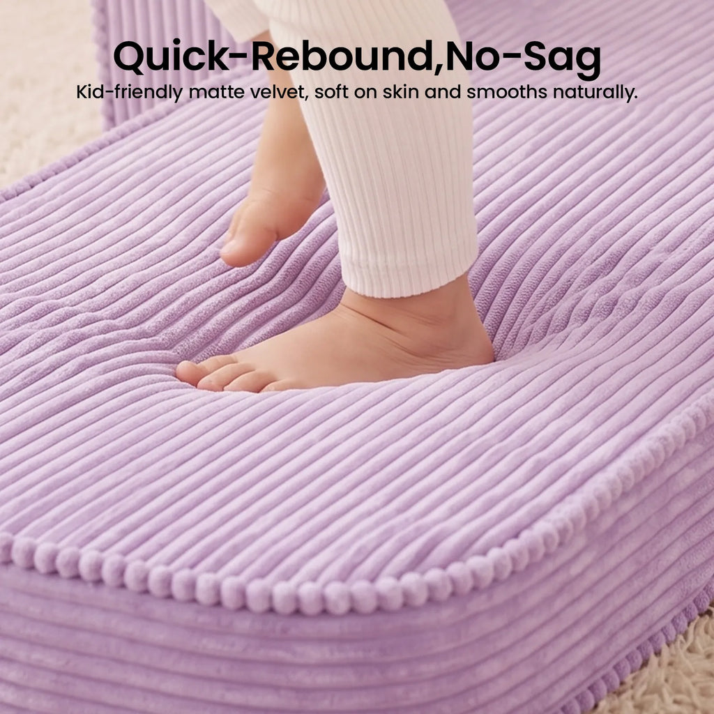 Purple corduroy seat cushion with rounded edge and soft pom-pom trim