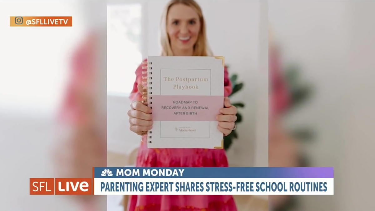 Postpartum planner guide cover held up, with title text and minimalist design