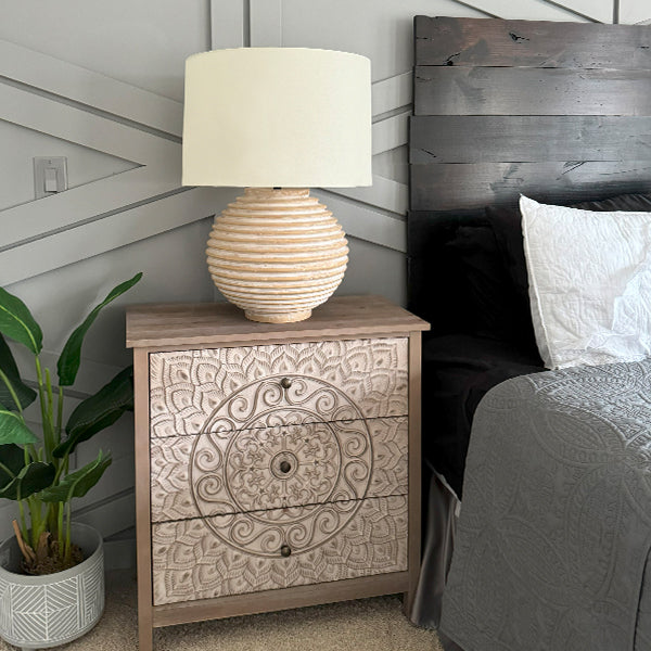 Weathered cream ribbed ceramic table lamp with white fabric drum shade