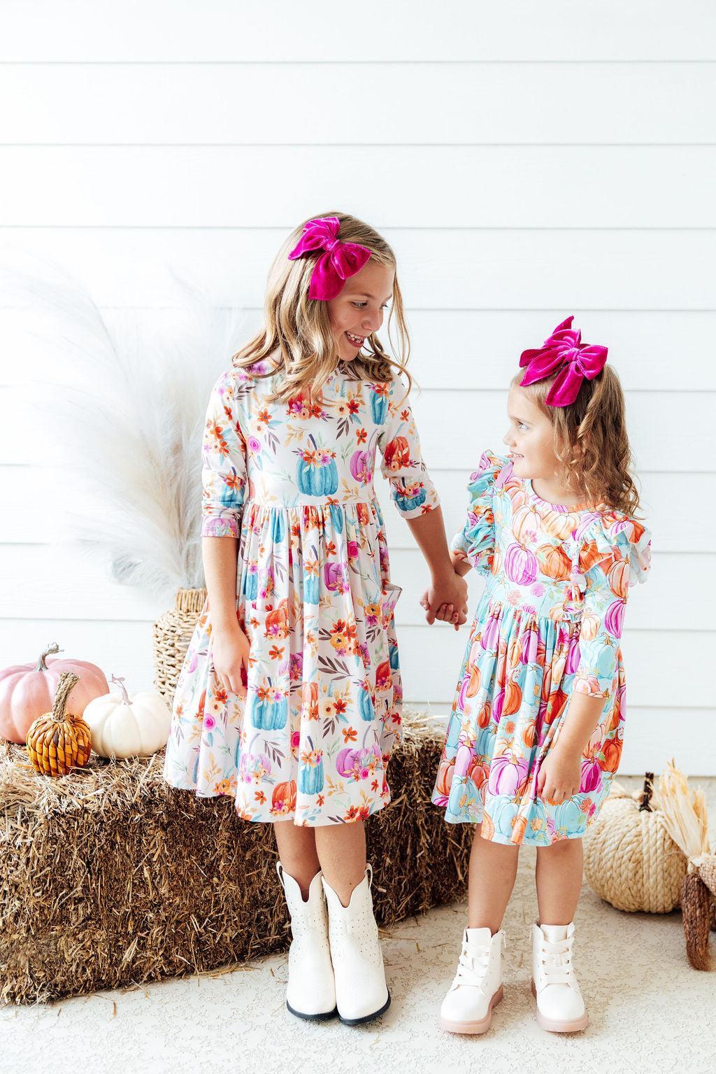 Girls twirl dress with ruffled sleeves, colorful pumpkin print, tiered skirt