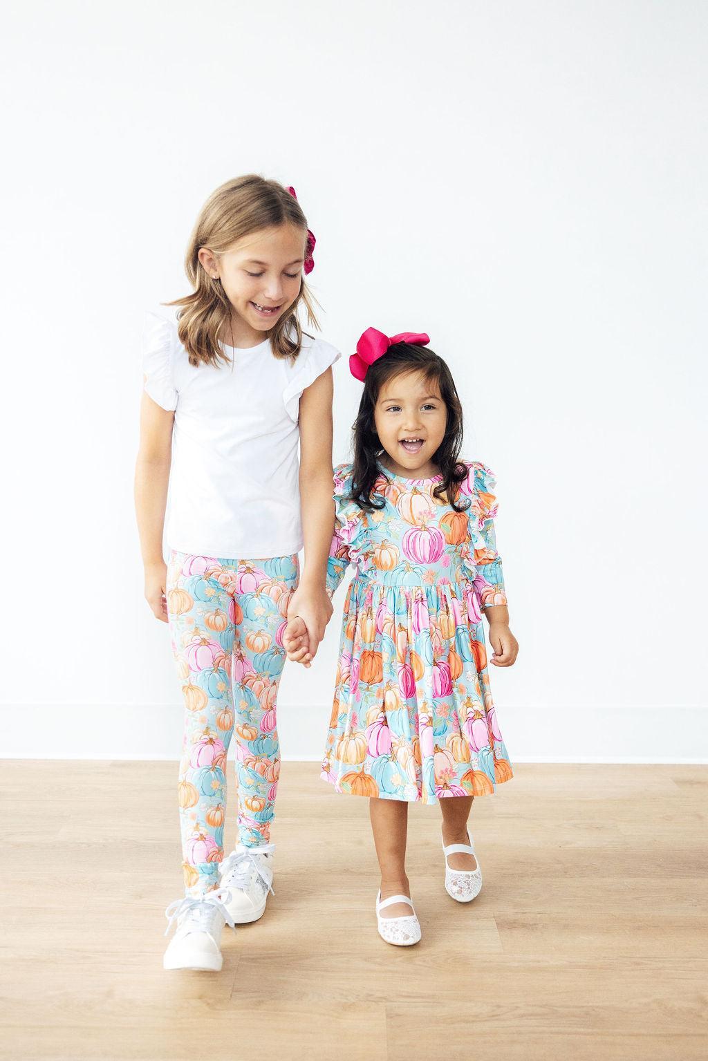 Girls pumpkin print twirl dress with ruffle sleeves and gathered bodice