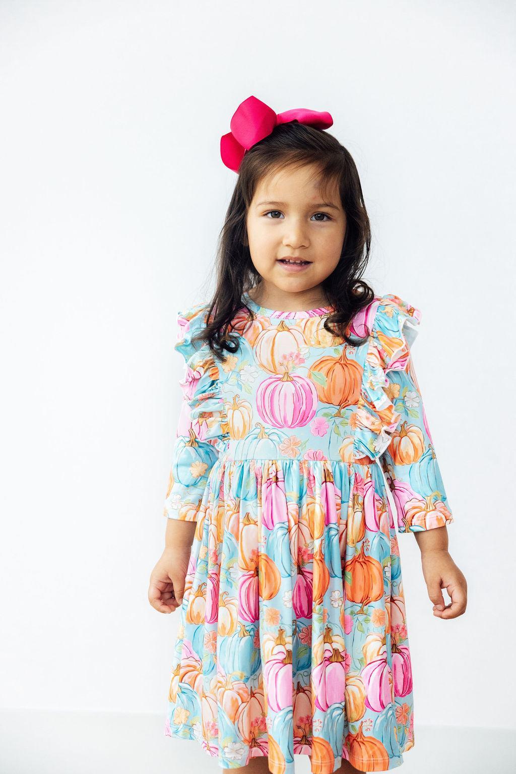 Girls ruffle 3/4 sleeve twirl dress in bright pumpkin print
