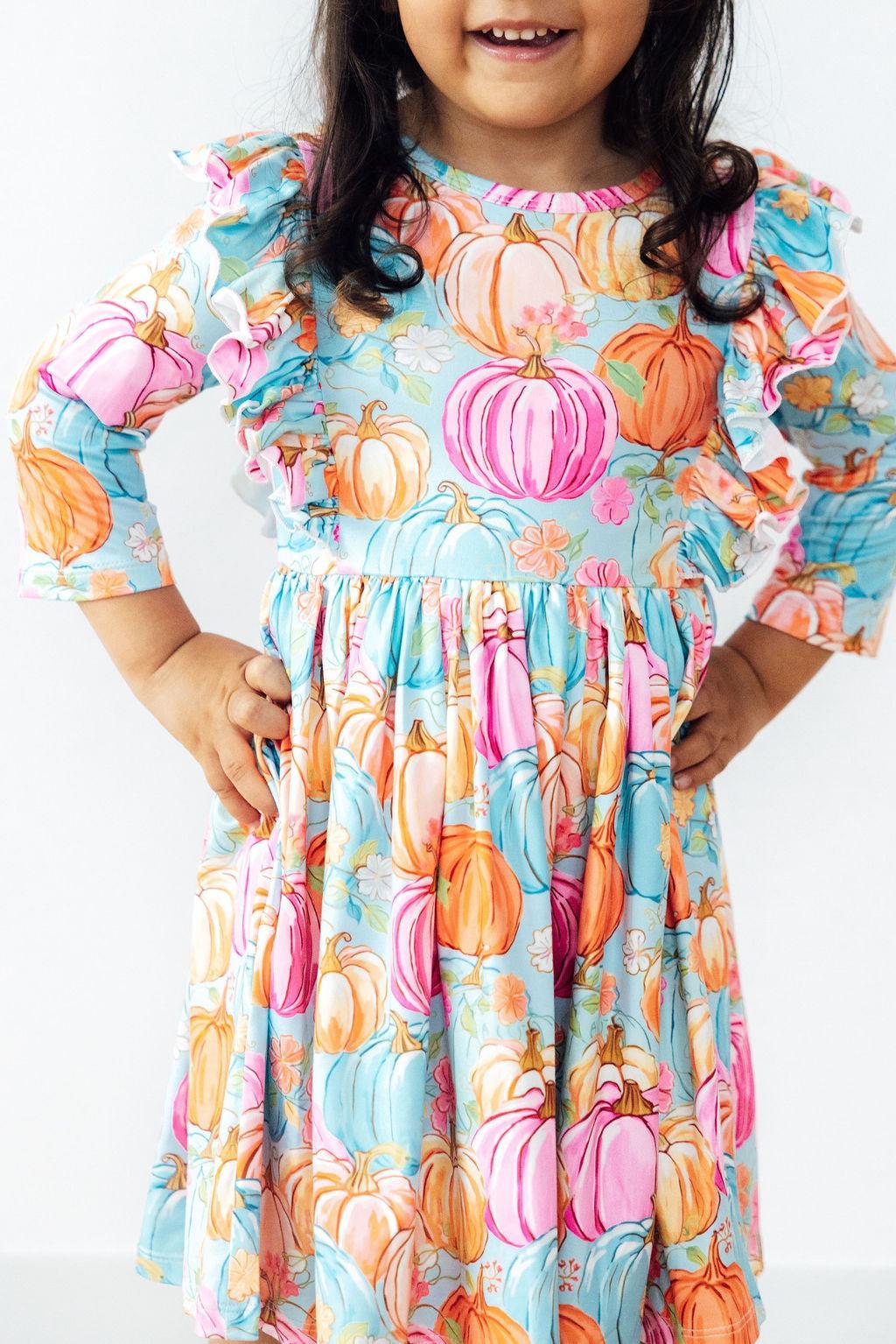 Girls ruffle 3/4 sleeve twirl dress with colorful pumpkin print