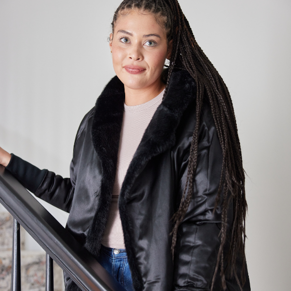 Black waterproof cardigan with plush faux-fur hood trim and zip front