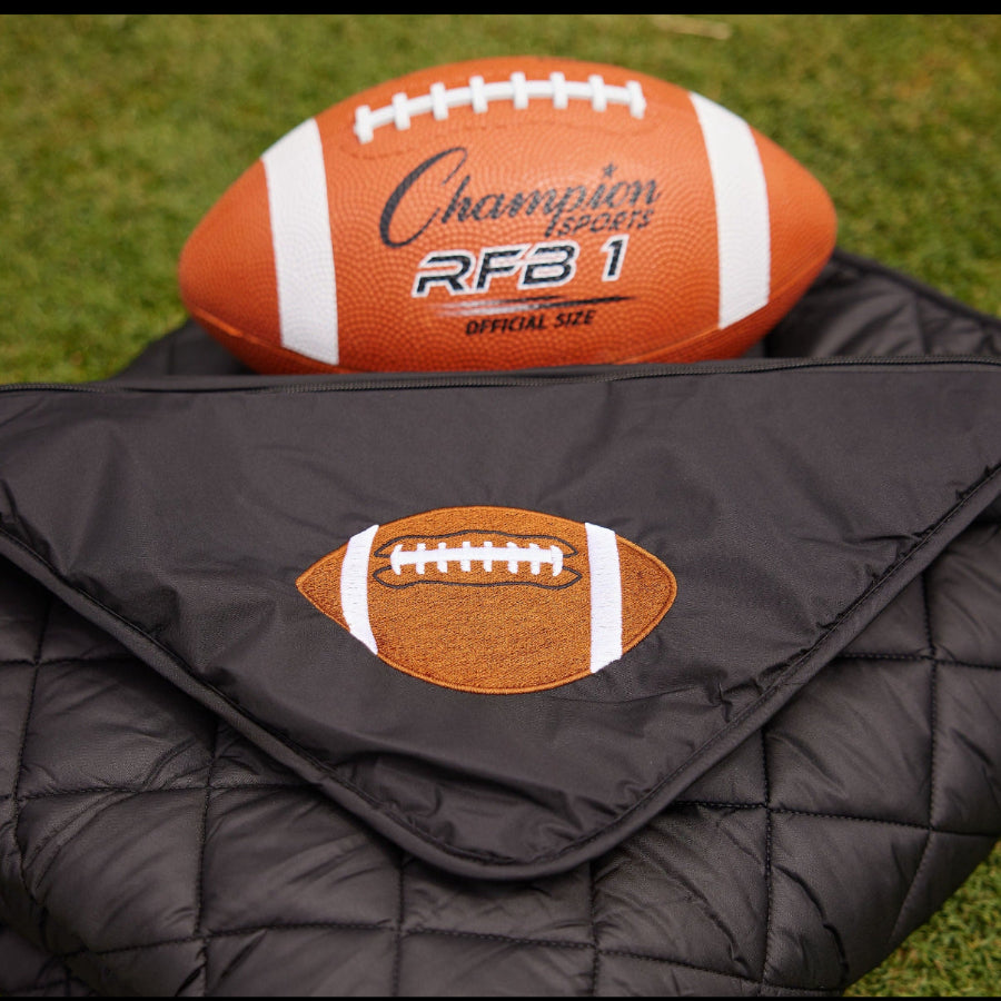 Black quilted puffer blanket with football-shaped pocket applique