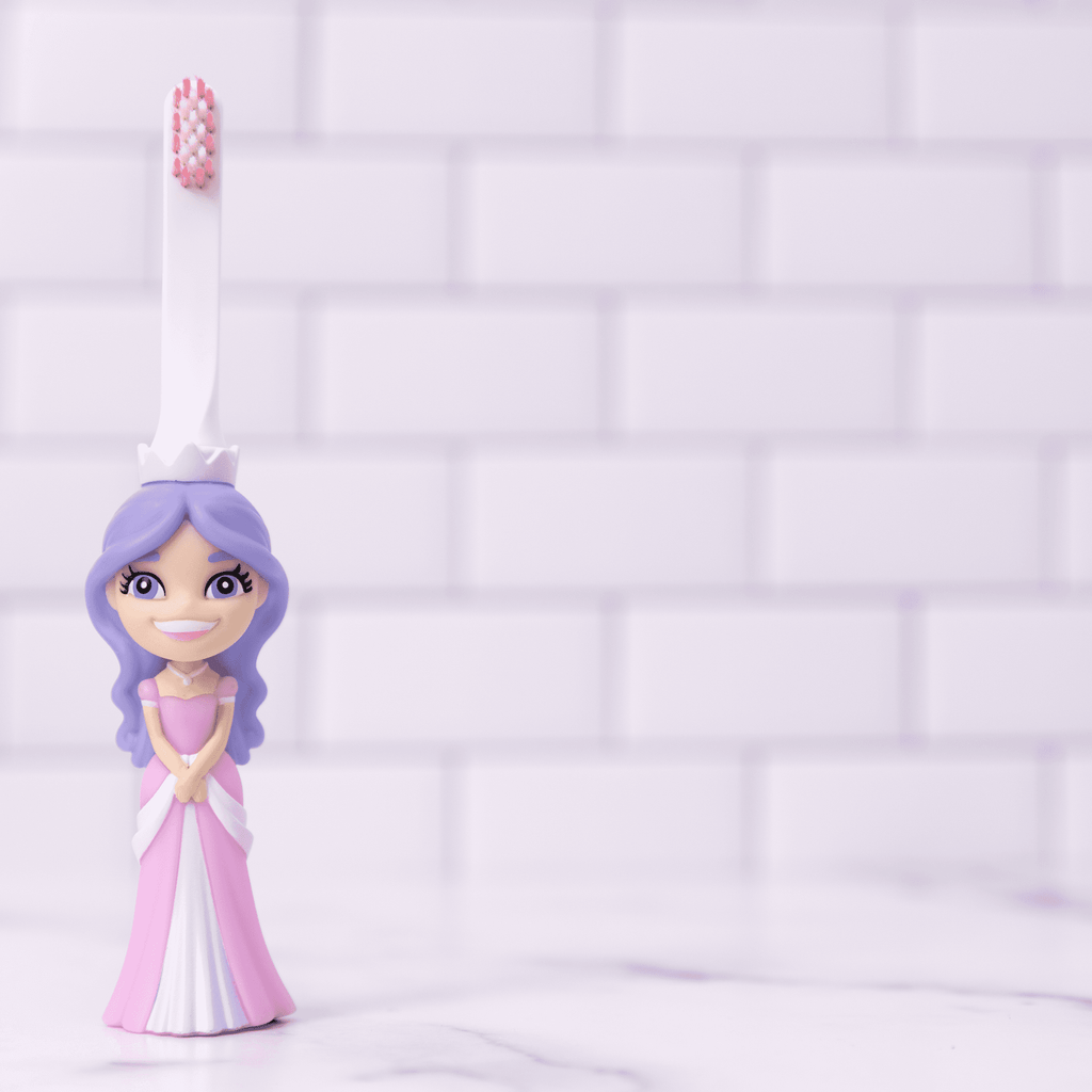 Princess-themed kids toothbrush with white handle and pink bristles