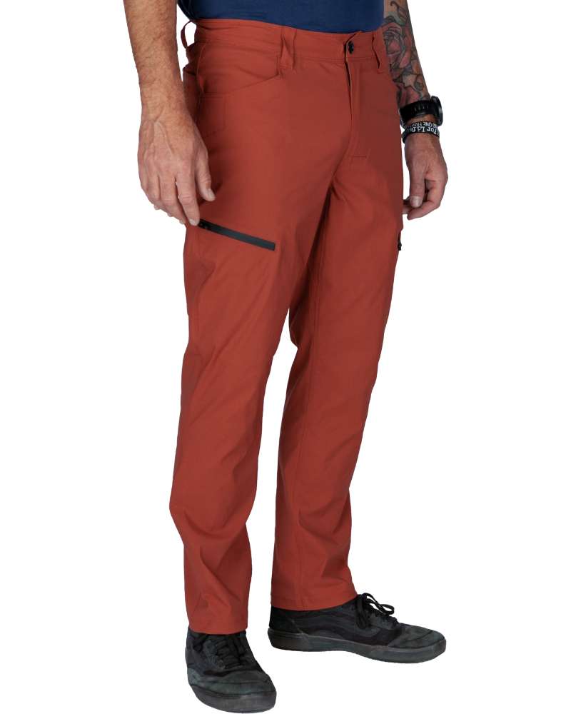 Rust red tapered pants front view with thigh pocket and zipper coin pocket