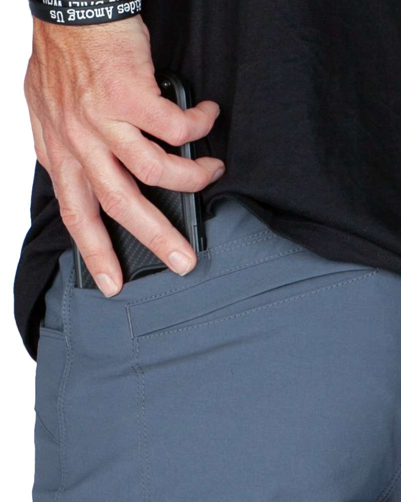 Tapered pants waistband with side pocket and visible zipper pull