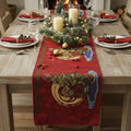 Red woven tapestry dining table runner with Santa and Christmas tree graphic