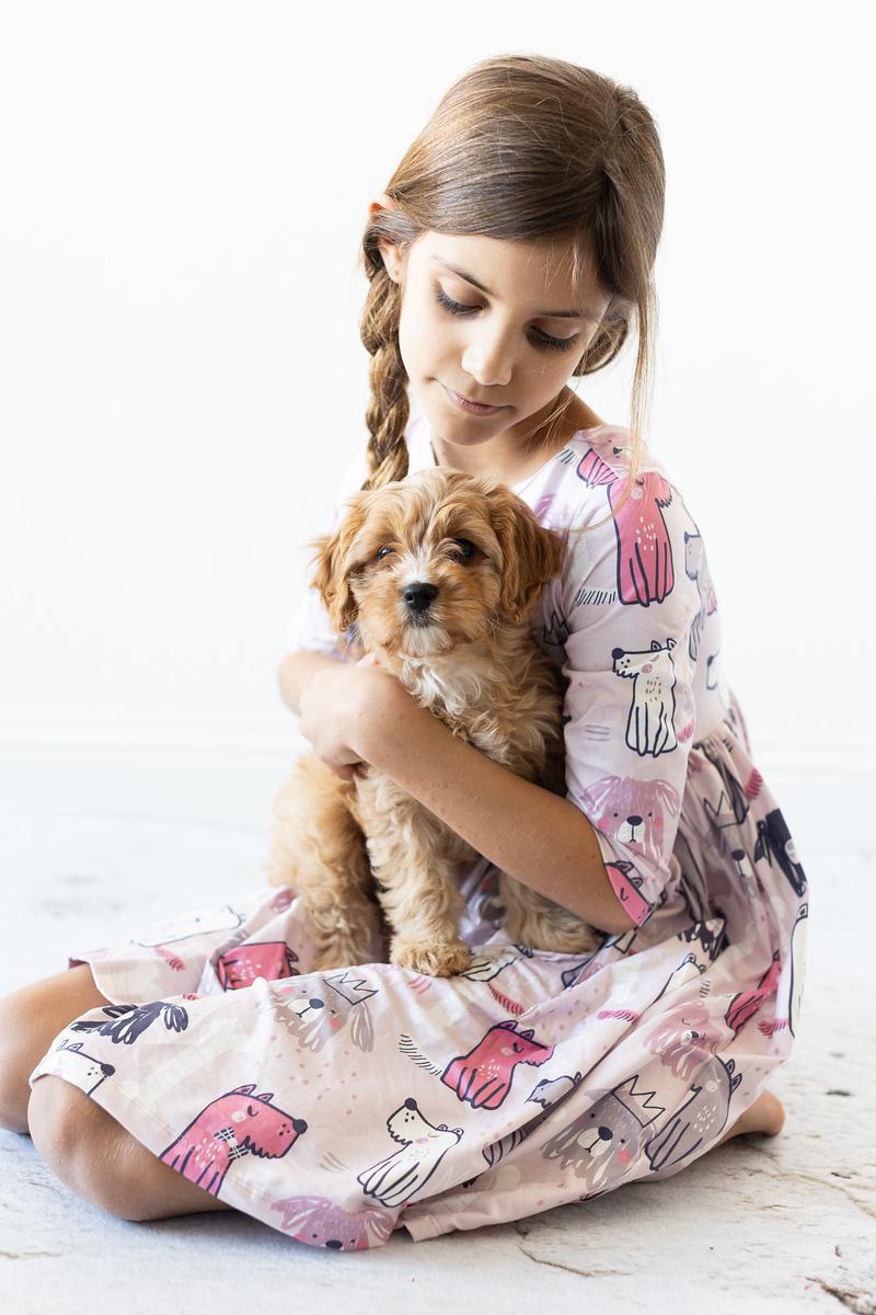 Girls' light pink dog-print twirl dress with 3/4 sleeves and gathered skirt