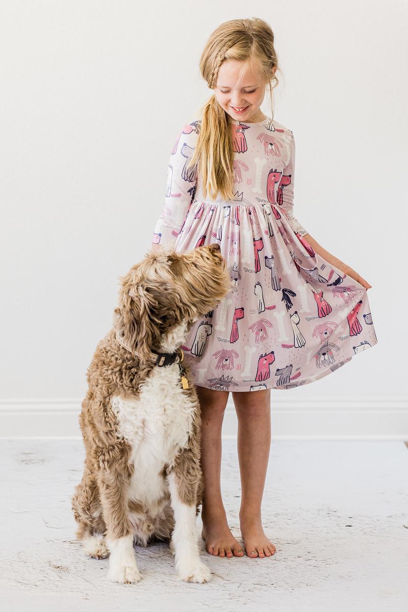 Girls' light pink dog-print twirl dress with gathered waist and fluttery skirt hem