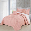 Dusty pink damask embroidered bedspread set with pillow shams on queen bed