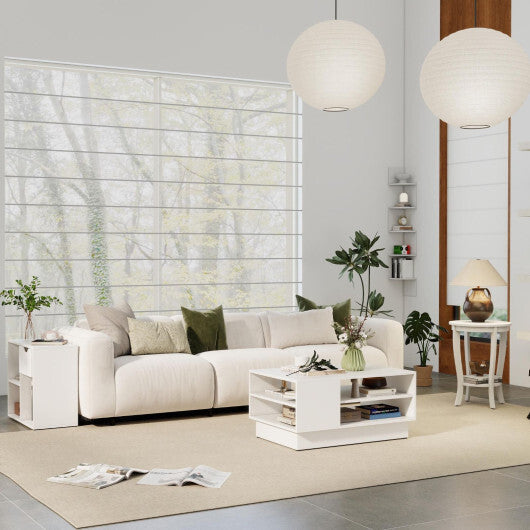 White modern coffee table with open shelf beside cream sofa