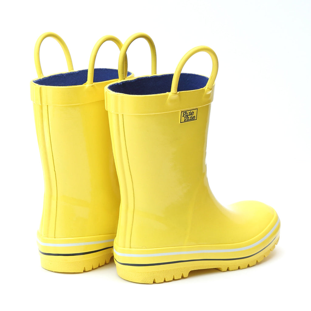 Pair of yellow rain boots with navy cuffs and striped rubber soles