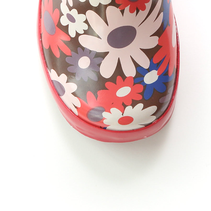 Floral rain boot toe with red trim and multicolor flower print