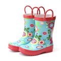 Kids rain boots with teal floral print, red handles, and thick tread rubber soles