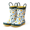 White rain boots with multicolor dot pattern, dark green top trim and rubber sole