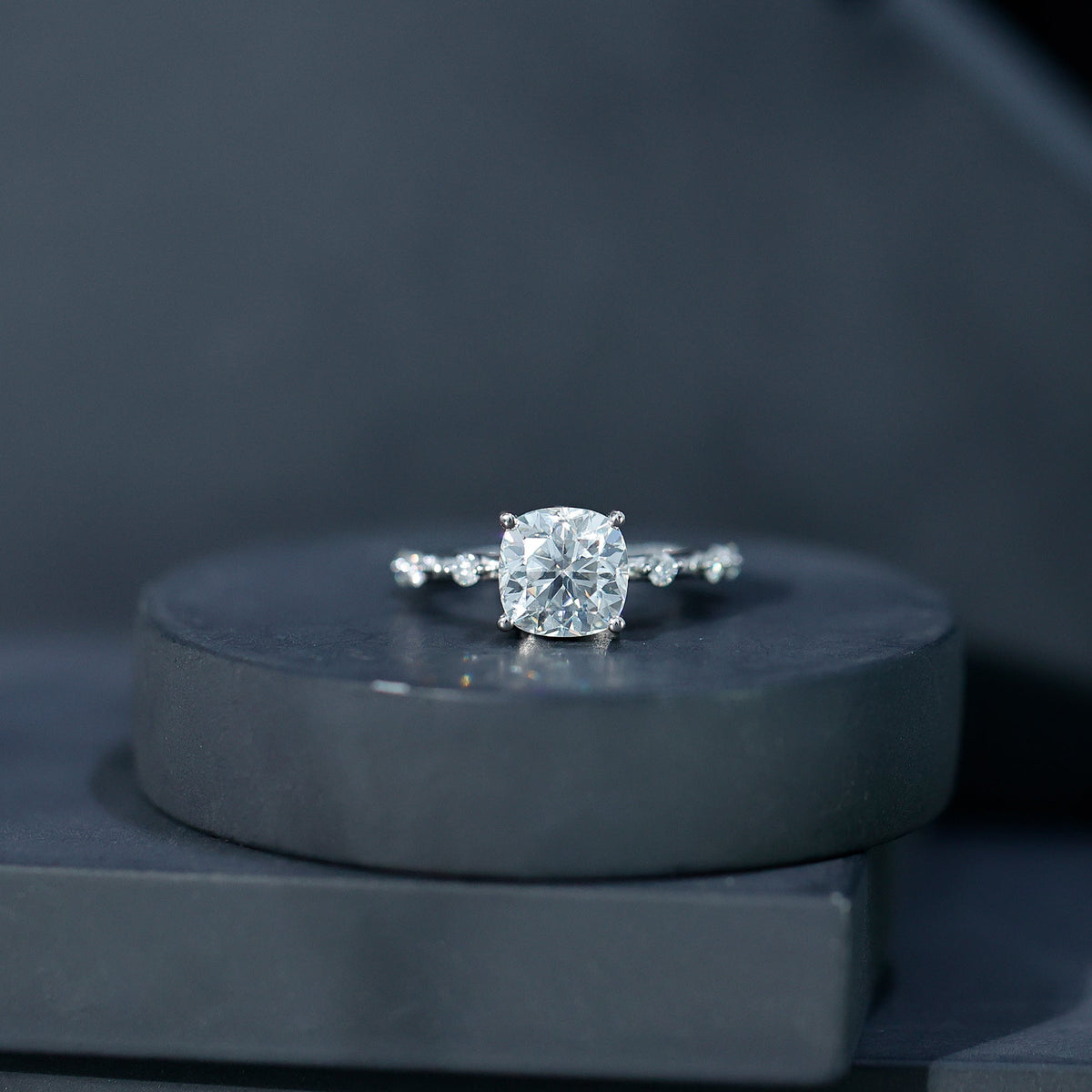 Cushion-cut lab diamond solitaire ring with side accent stones