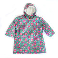 Green hooded raincoat with circular chain pattern, button-front, short sleeves