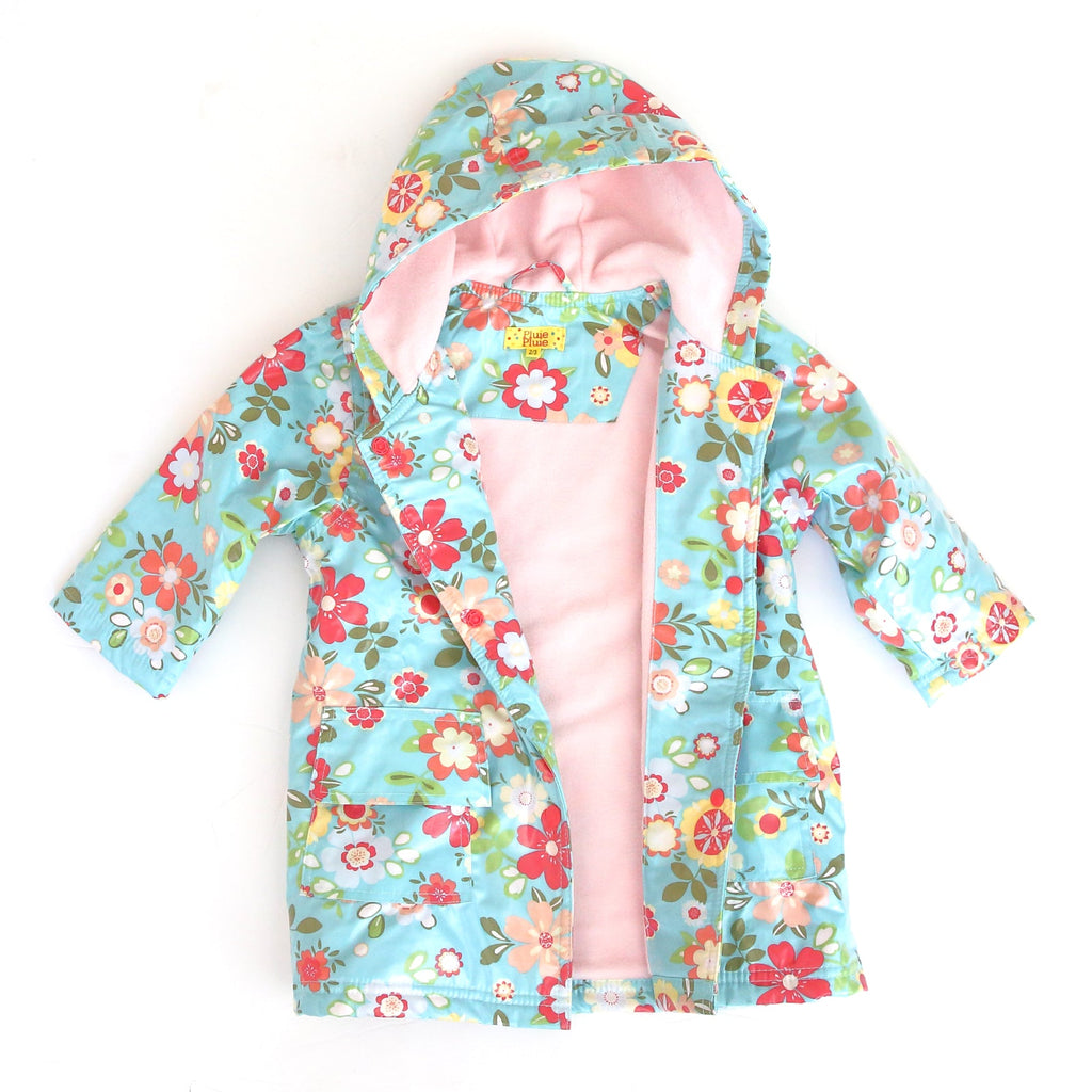 Kids light blue floral raincoat with hood, open front and pink interior lining