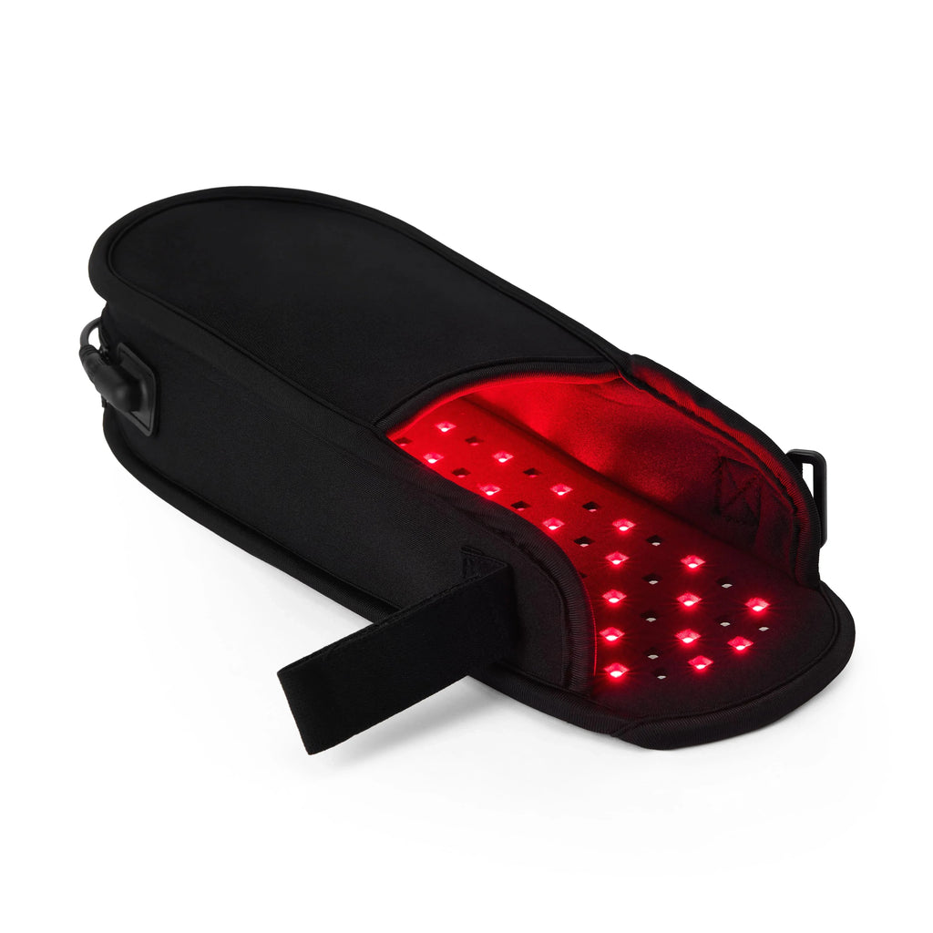 Black therapeutic light slippers with red LED panels on the toe and top