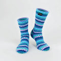 Ripple fleece socks with blue, teal, and purple striped pattern, crew height.