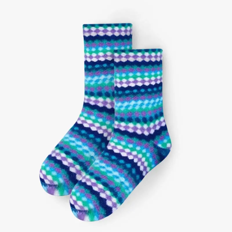 Pair of crew fleece socks with multicolor ripple stripes in blue, teal, and purple.