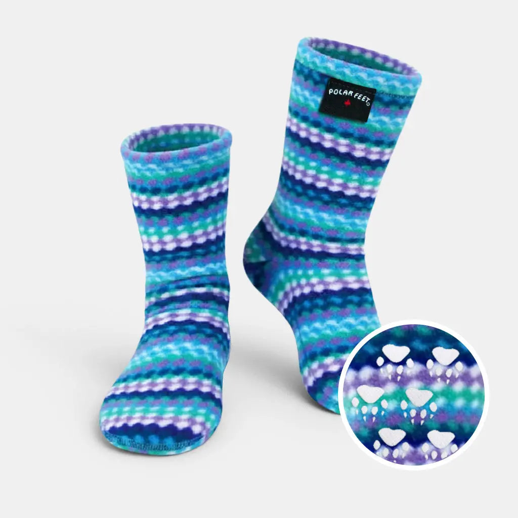 Crew fleece socks with ripple stripes; nonskid paw-print grip on soles.