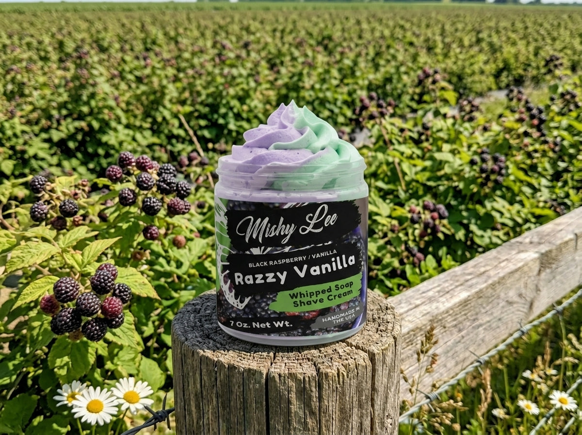 Whipped soap and shave cream jar on wood with purple and mint swirl top