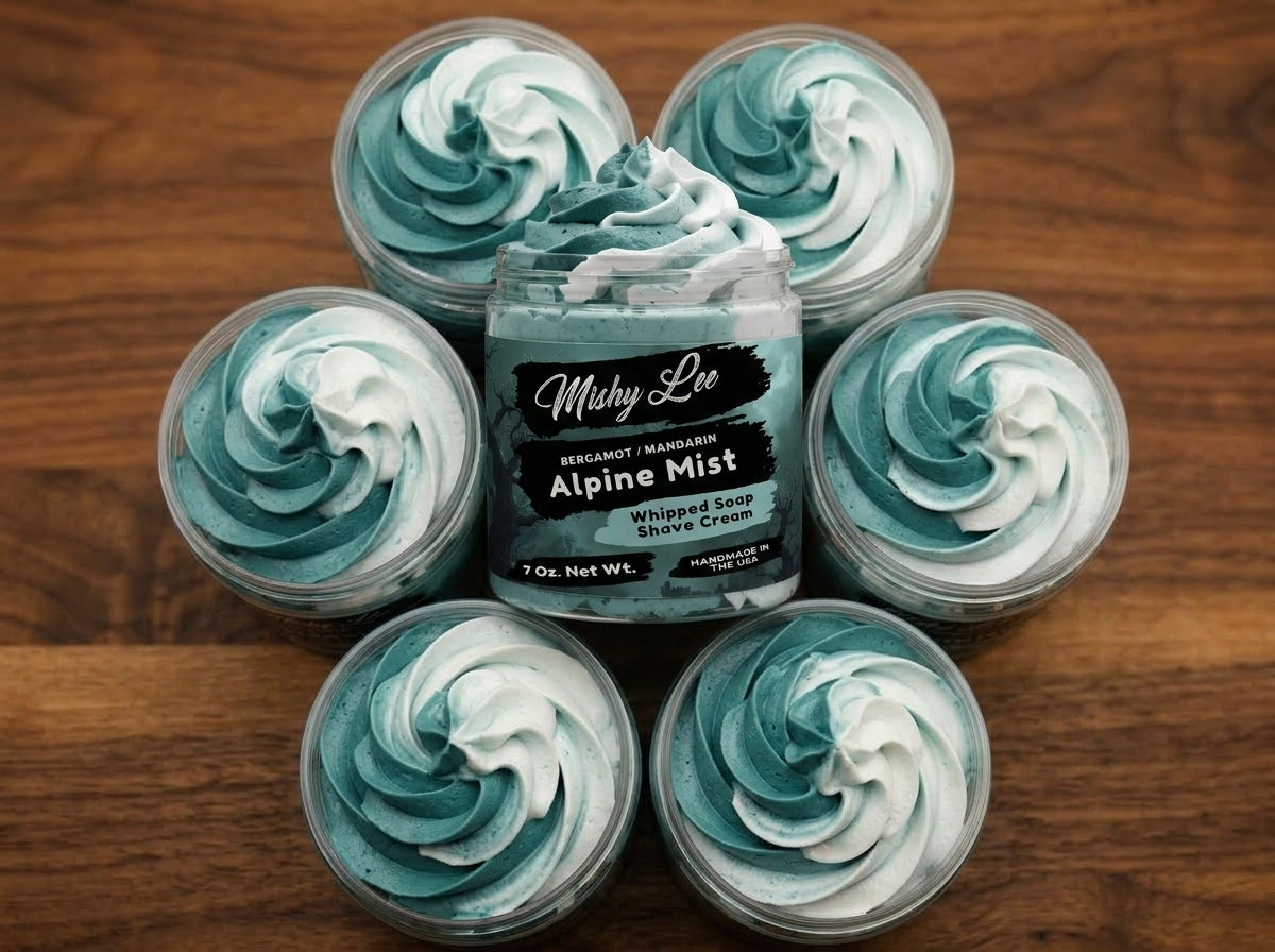 Men’s whipped soap and shave cream jar with multiple turquoise whipped swirls in cups.