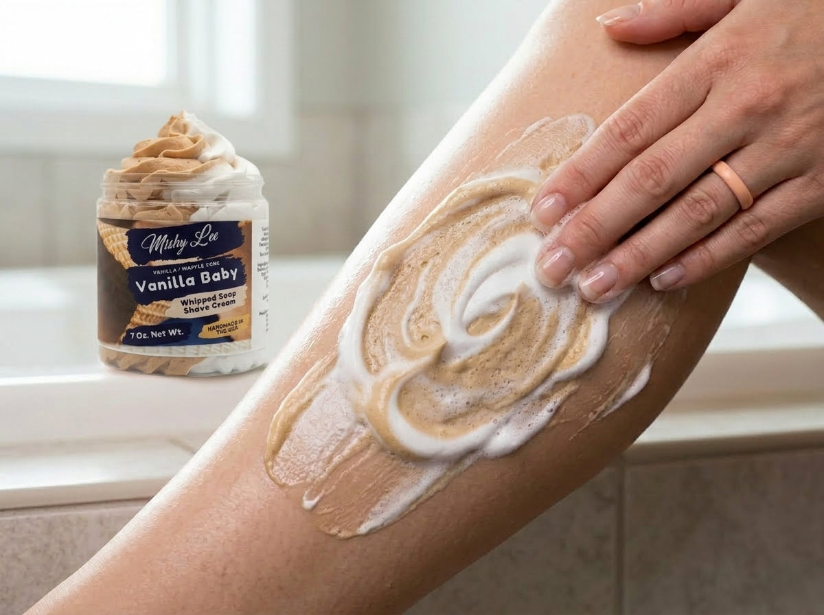Vanilla baby whipped soap and shave cream applied to arm with creamy beige foam swirls