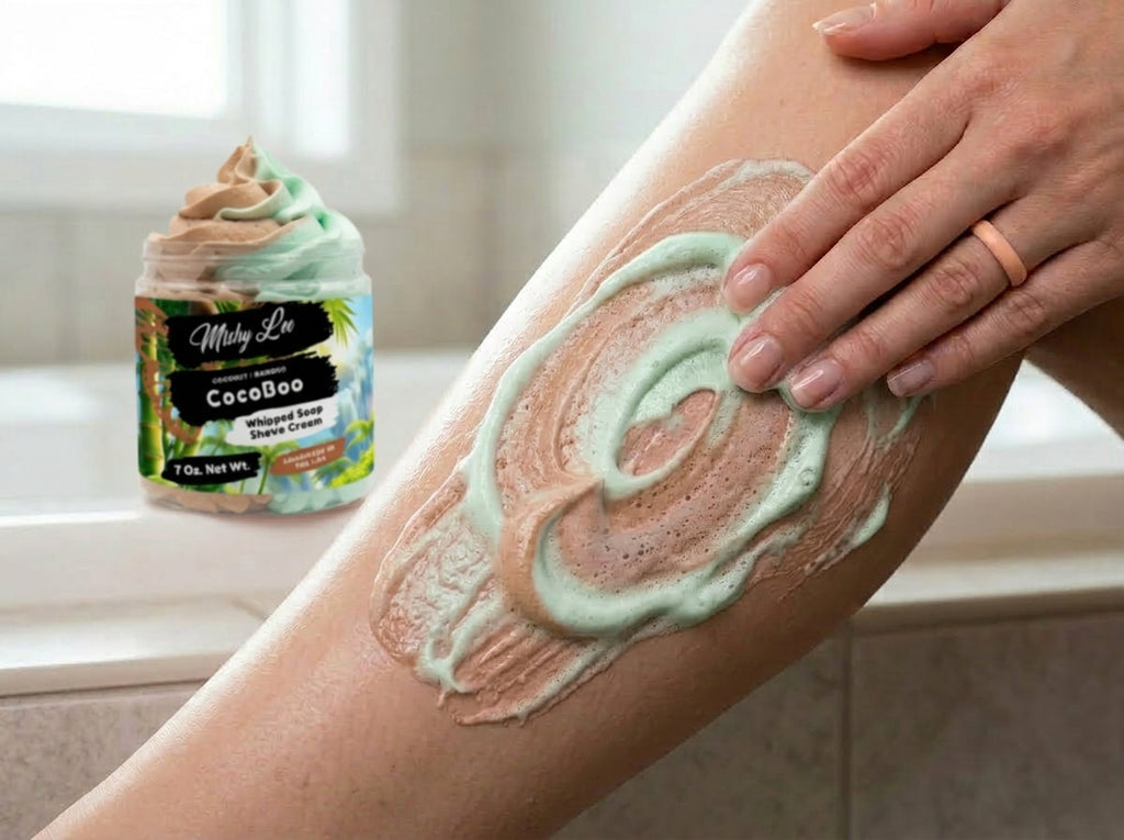 Mint and tan whipped soap and shave cream spread on skin with jar in background