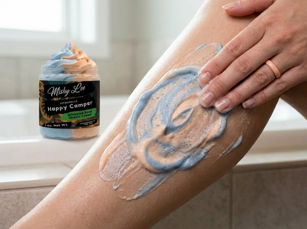 Blue and peach whipped soap and shave cream lather on skin with product jar nearby