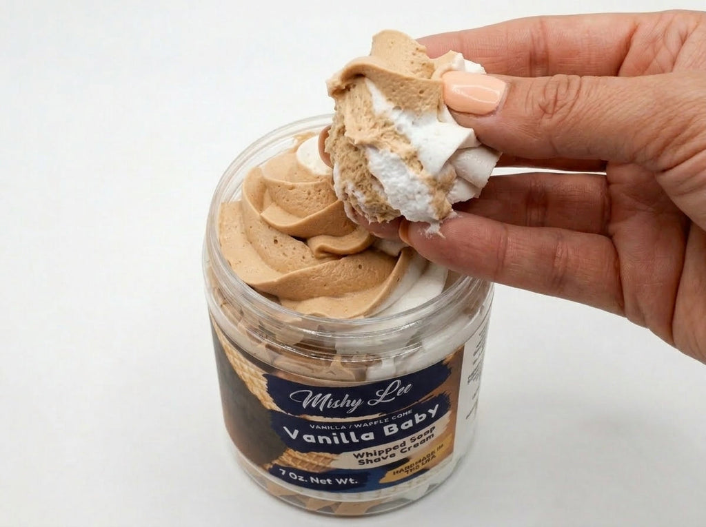 Vanilla baby whipped soap and shave cream jar with hand holding thick whipped soap